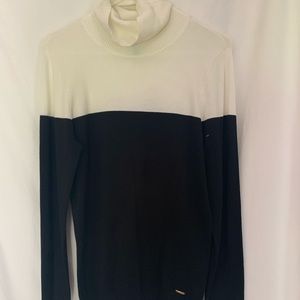 NWT Calvin Klein Black and White turtleneck size medium.